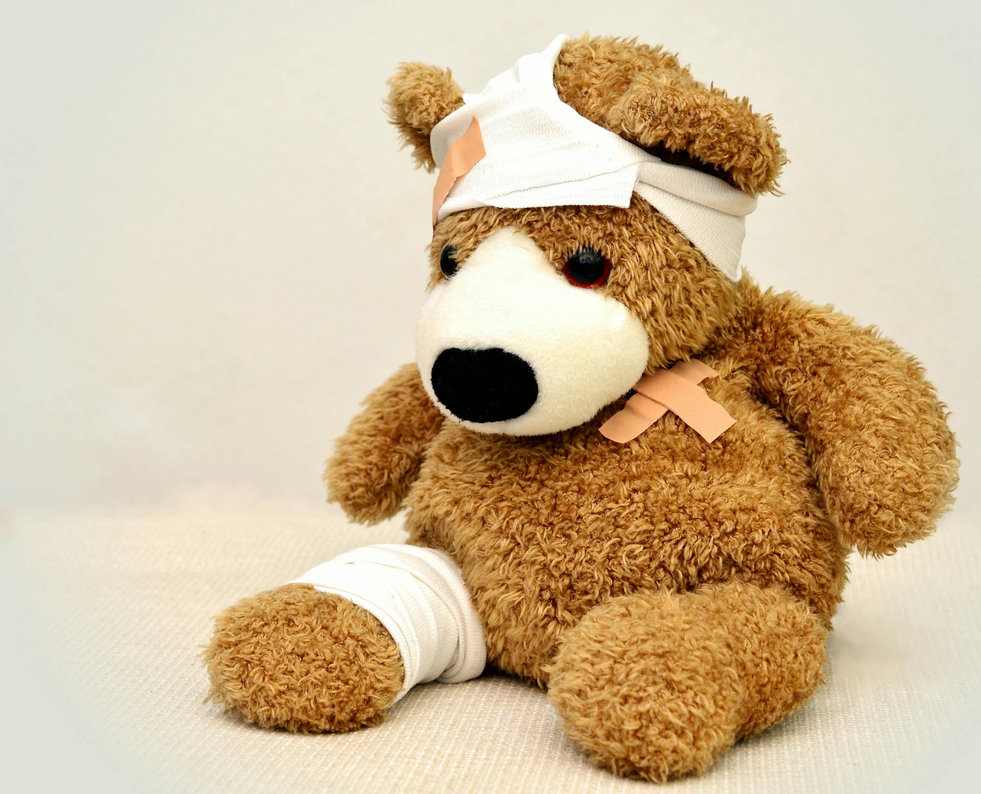 Teddy bear with bandage